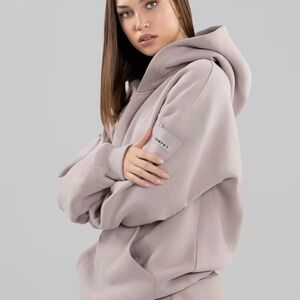 COMFRT travel essential hoodie color is BARK